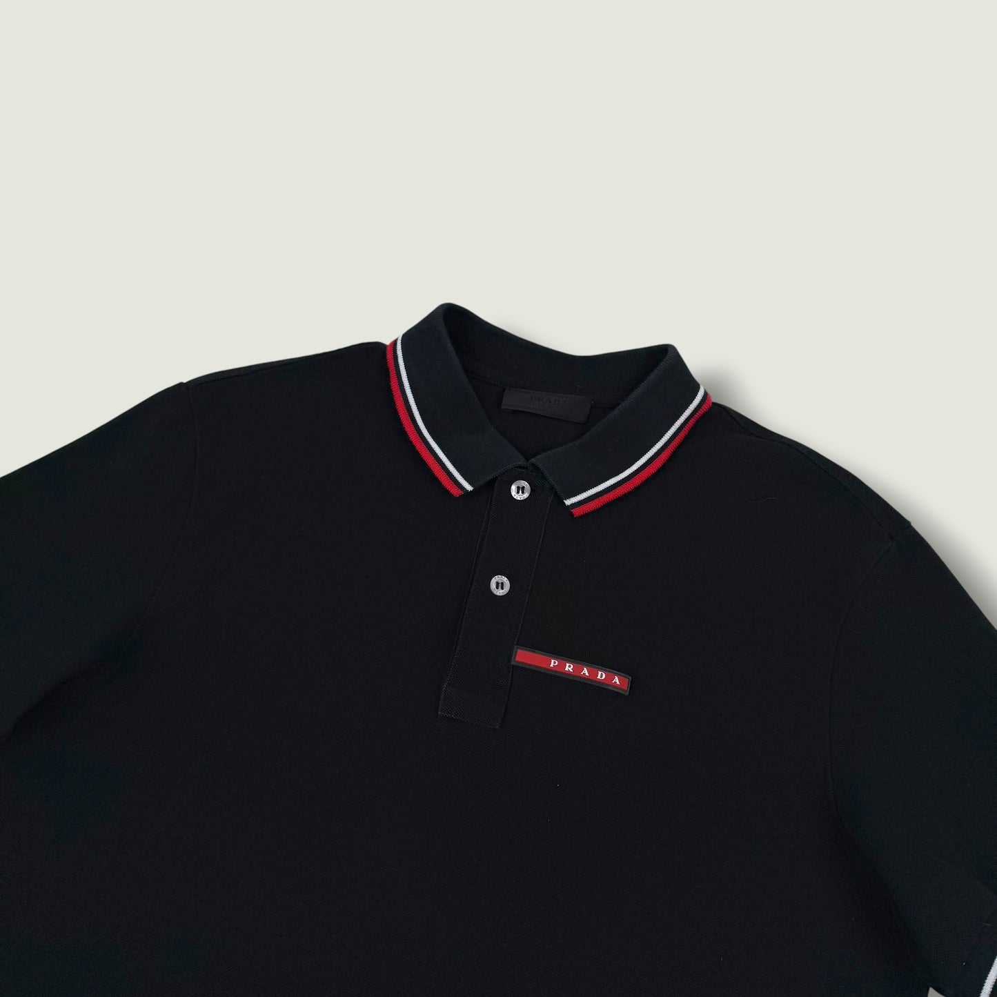 Prada Polo (L)