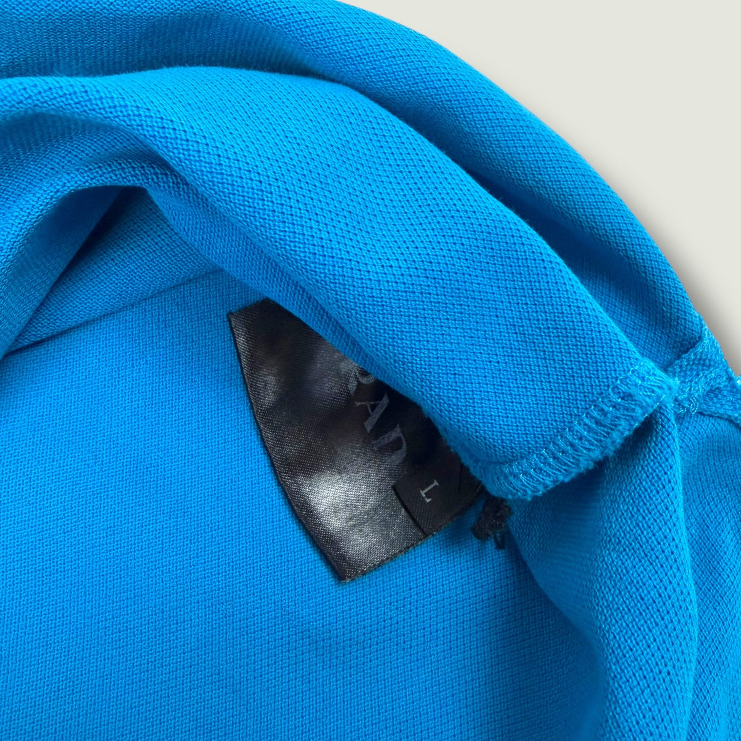 Prada Polo (L)